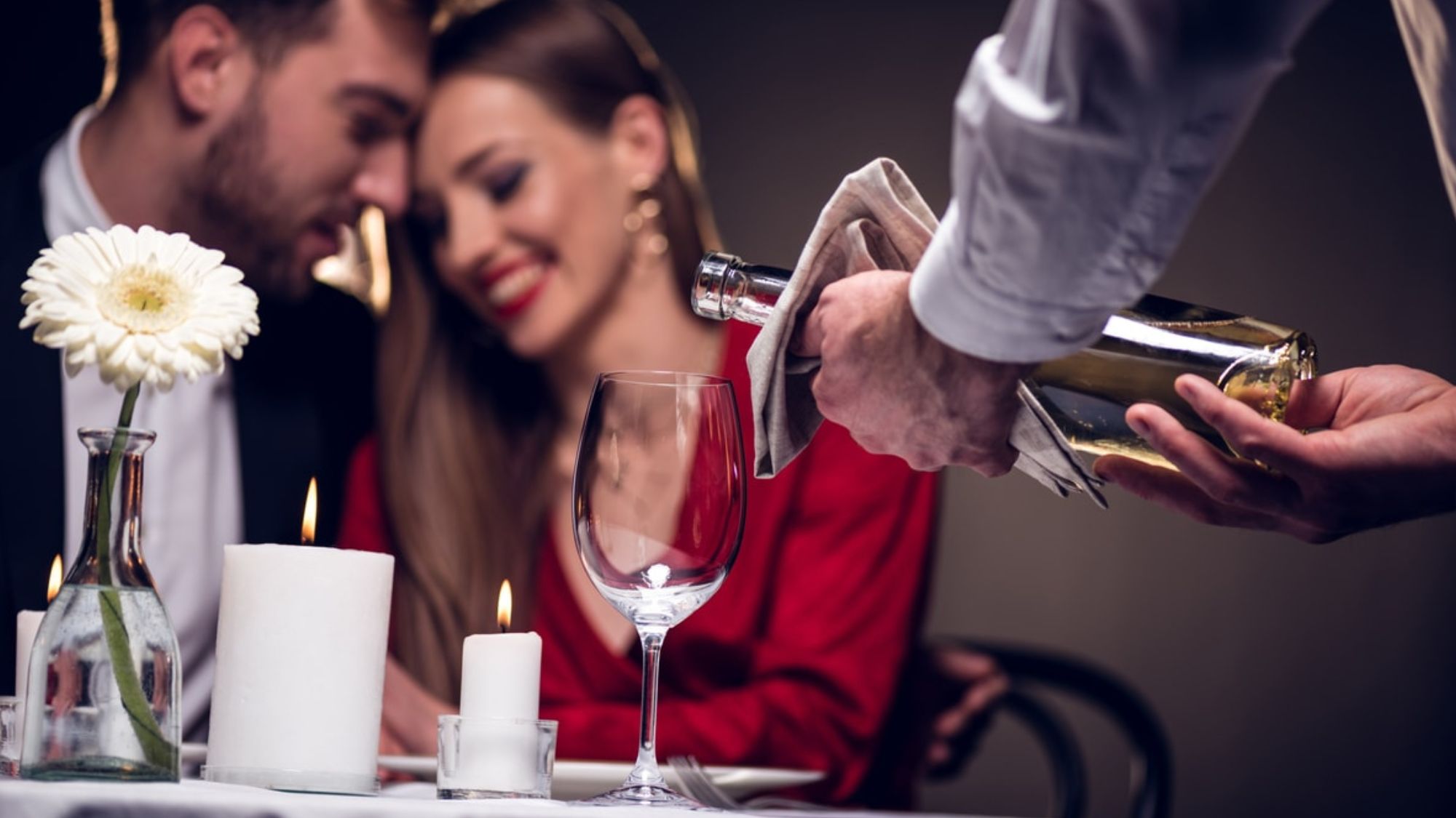 A couple celebrating valentine's day in a restaurant