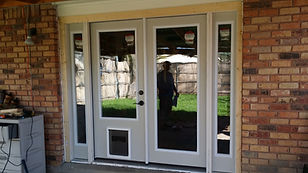 french doors with doggie door built in